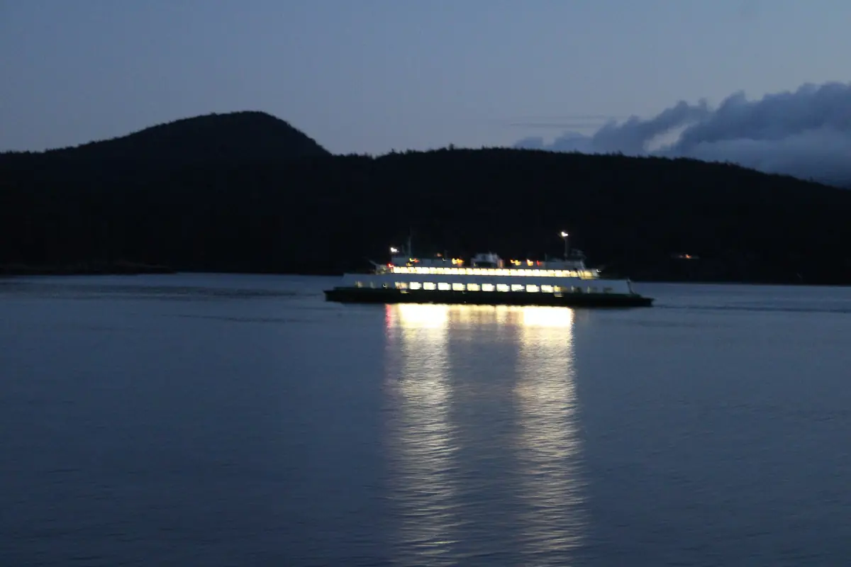 A ferry crossing the islands before dawn